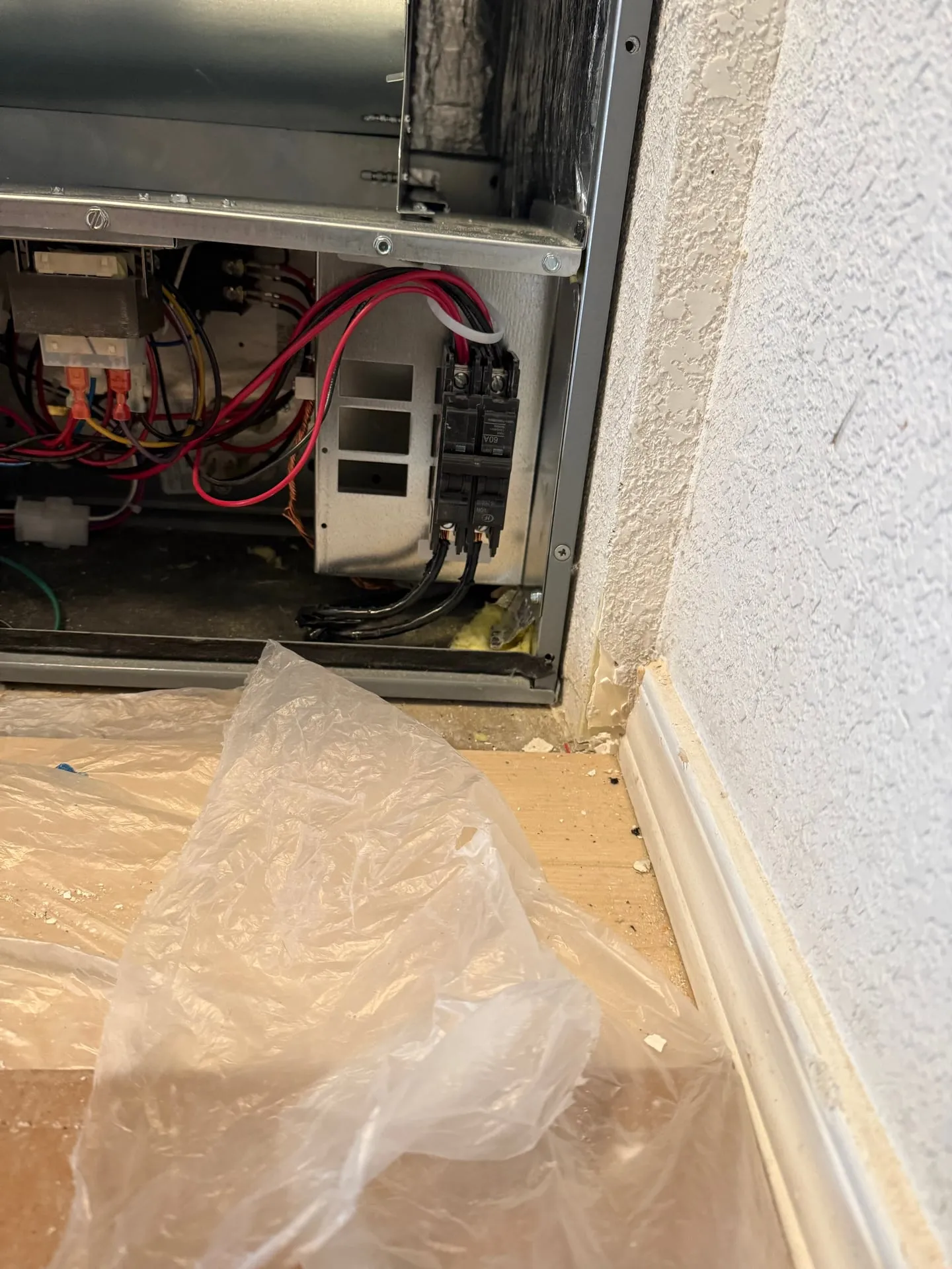 Interior of an air handler cabinet in a manufactured home in Orchards, Vancouver WA showing the electrical connections landed during the reconnect