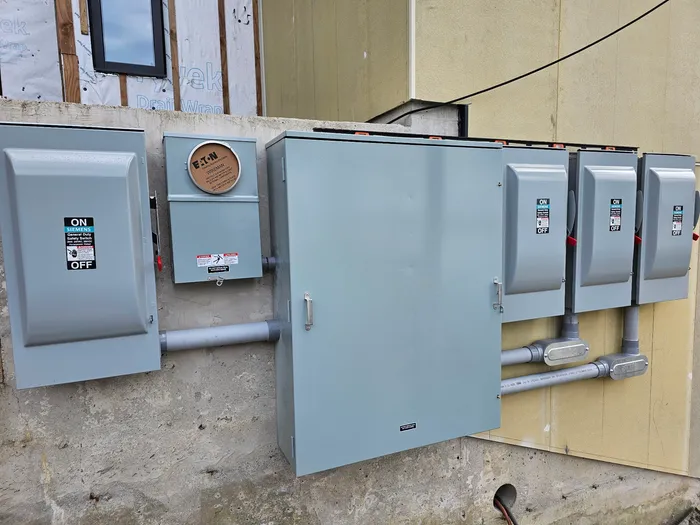 Commercial panel array installed during tenant improvement by Newman Electric
