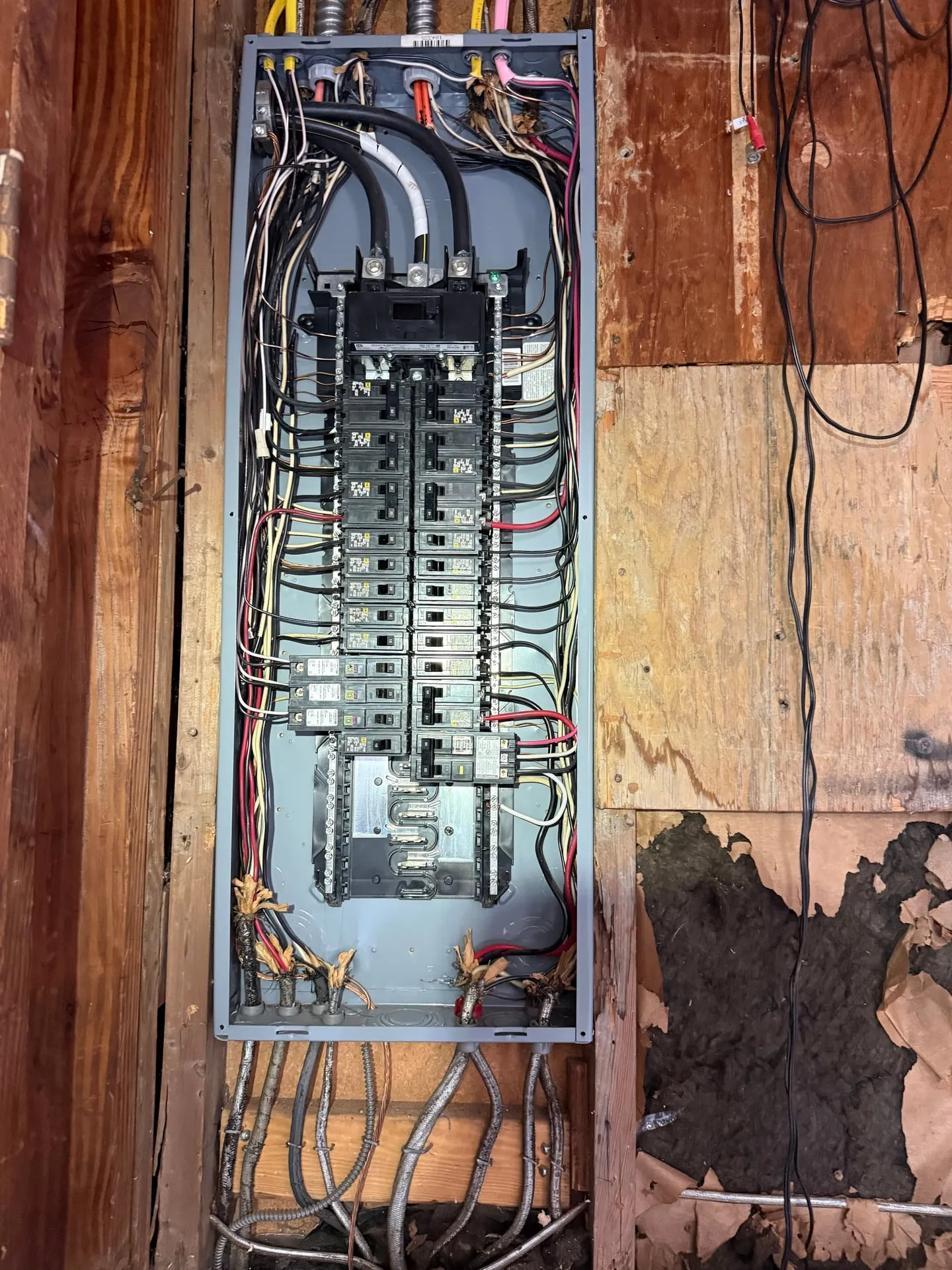 Open Square D Homeline panel in a Vancouver WA home with new branch circuit conductors landed for the washer, dryer and dishwasher circuits