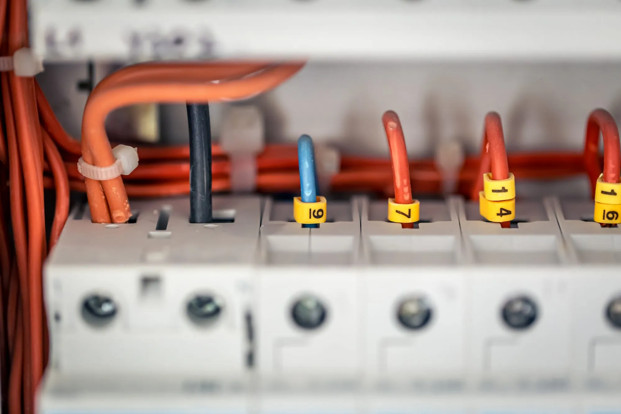Electrical panel with contactors and breakers showing proper safety wiring